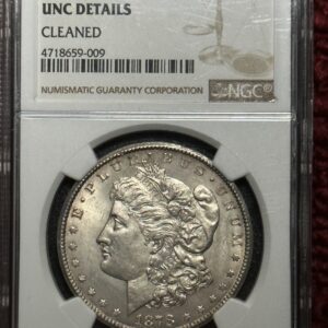 A silver dollar is on display in an ngc holder.