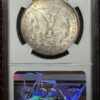 A silver dollar is on display in an old case.