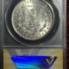 A coin is shown next to a blue card.