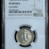 1904 French Franc coin in a holder.