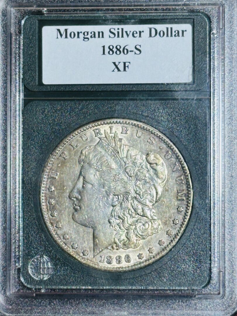 1886-S Morgan Dollar XF45 coin in a transparent secure case, displayed with label at top.