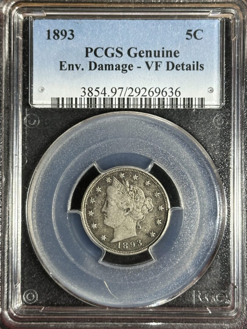 1893 Liberty Nickel NGC VF details in a pcgs protective case labeled as "genuine, environmental damage - vf details," including case reference numbers.