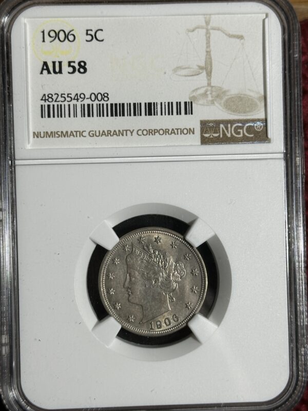 A 1906 Liberty Nickel NGC AU58, enclosed in a labeled protective case.