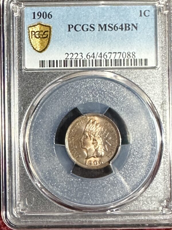 A 1906 Indian Head Cent PCGS MS64 BN coin, encased in a protective holder with identification label at the top.