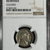 A 1920 Buffalo Nickel NGC AU details coin with the profile of a native american, labeled as "au details cleaned" by the numismatic guaranty corporation, encased in a protective holder with a barcode.