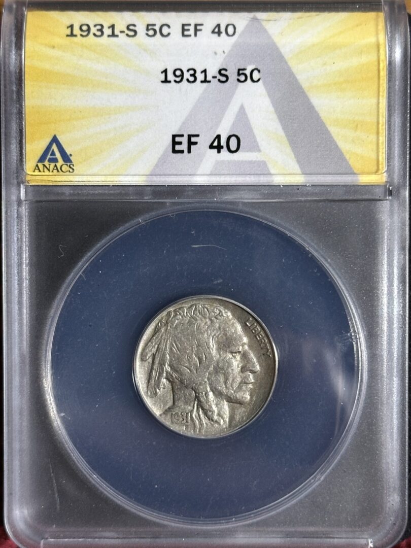 A 1931-S Buffalo Nickel ANACS EF40 encased in a transparent protective holder with a label showing the coin's details.