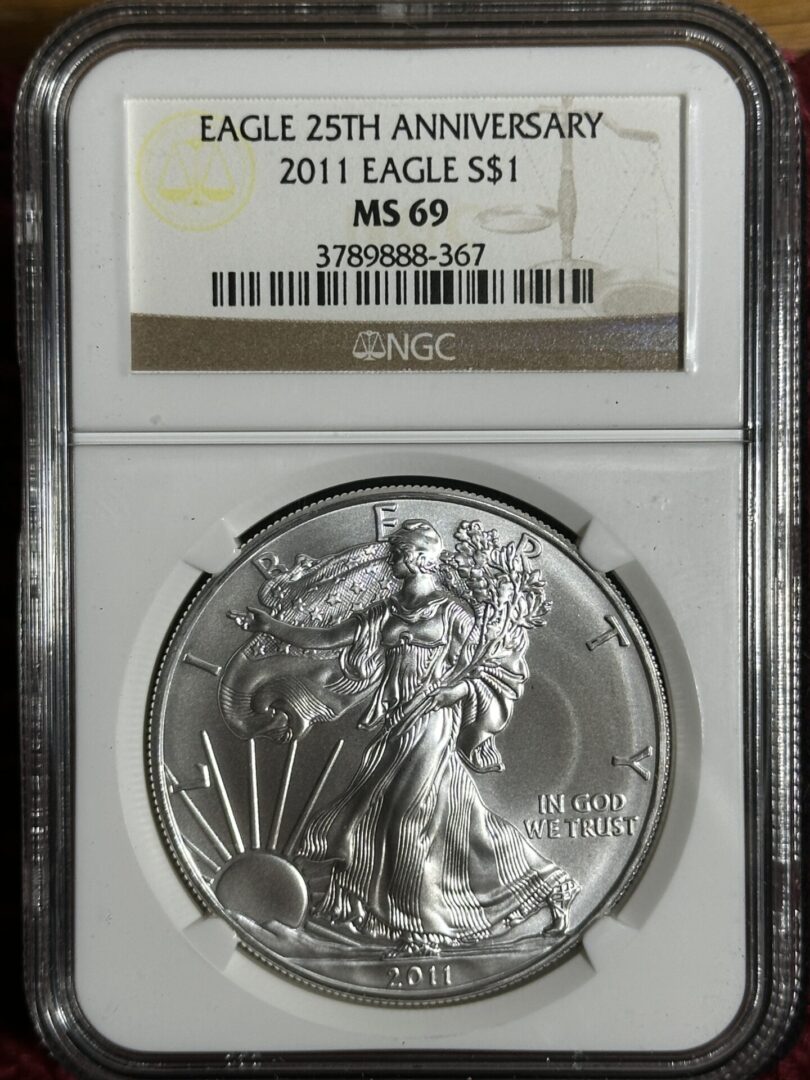 A 2011 American Silver Eagle NGC MS69 coin, encased in a protective holder with a certification label.