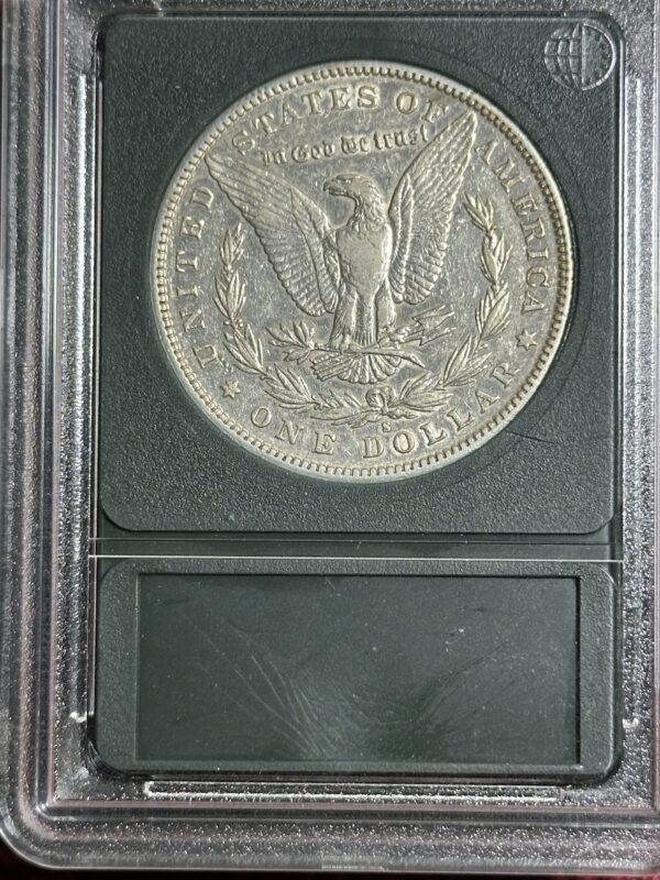 A close-up of an 1889-S Morgan Dollar XF45, featuring an eagle and the inscription "in god we trust," encased in a protective holder.