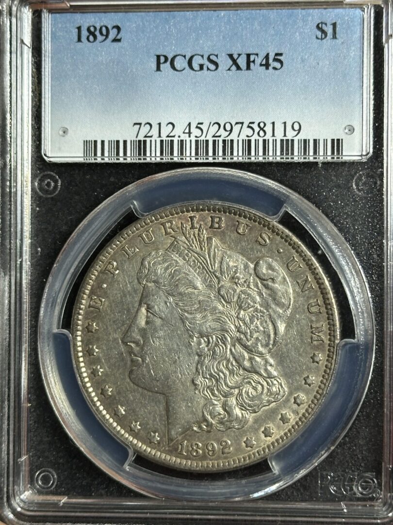 1892 Morgan Dollar PCGS XF45 graded by PCGS in a protective case, showing the Liberty Head design and surrounding text.