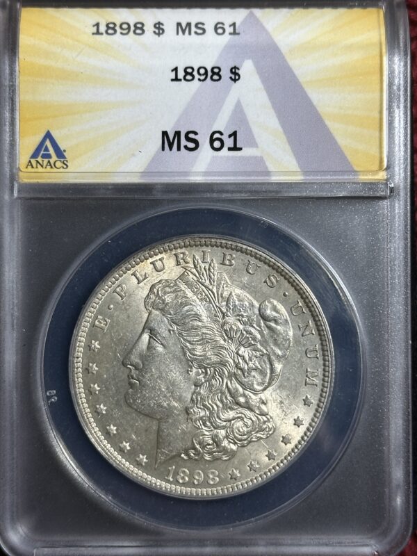 1898 Morgan Dollar ANACS MS61 in a protective case, with label indicating type and grade.