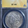 A 1901 Morgan Dollar ANACS XF45, displayed in a protective case with labels showing details and grading information.