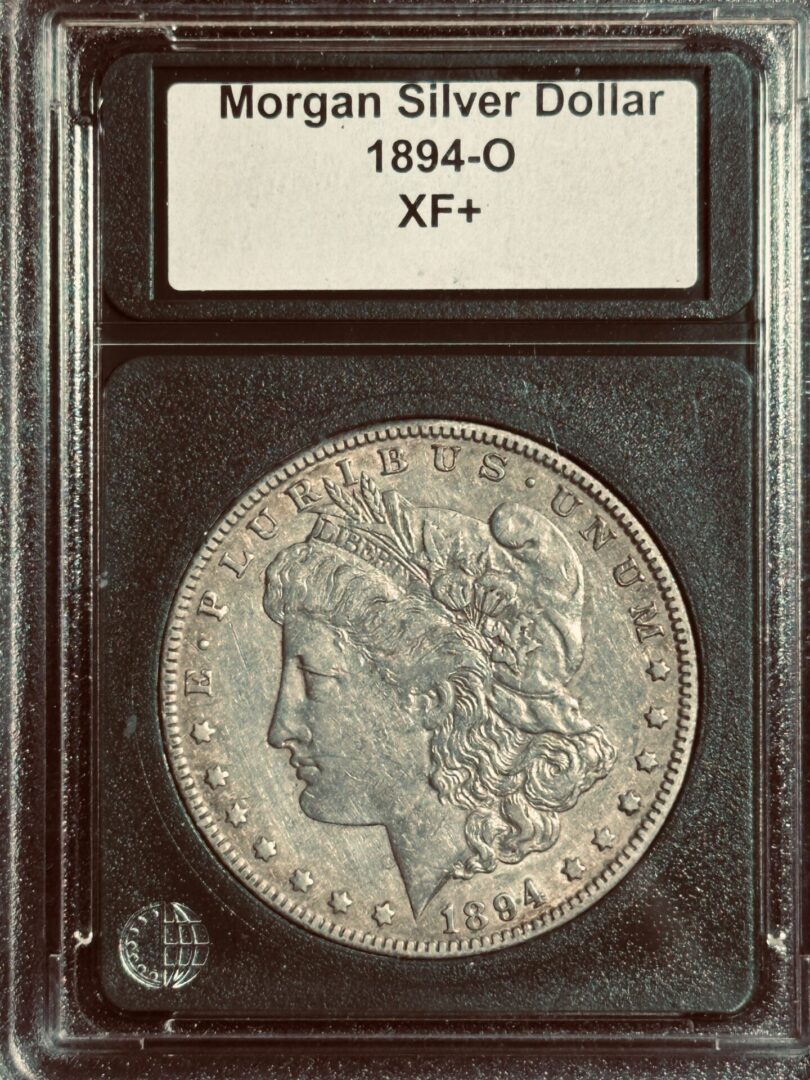 1894-O Morgan silver dollar in XF+ condition.