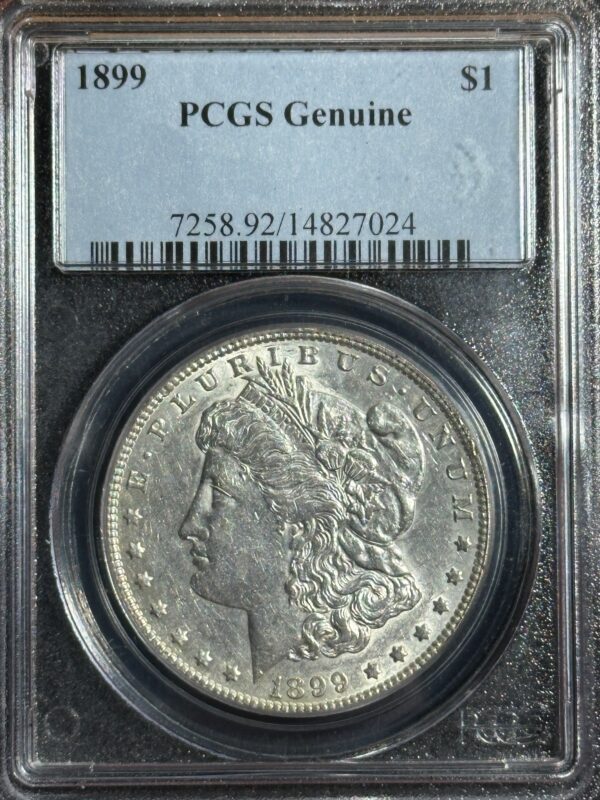 A 1899 silver dollar coin encased in a protective pcgs holder displaying the coin's details and certification number.