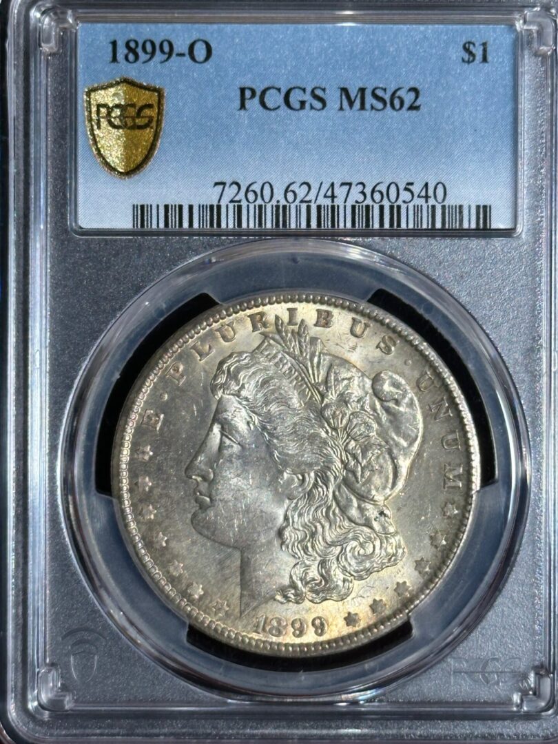 1899-o morgan silver dollar, graded ms62 by pcgs, encapsulated in a protective holder with certification label at the top.