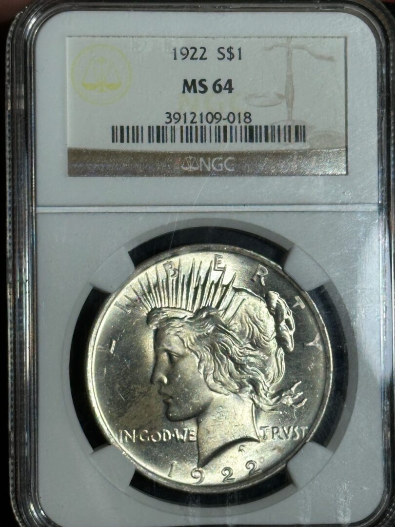 1922 silver dollar coin graded ms 64 by ngc, displayed in a protective case, showing the obverse side with liberty's profile.