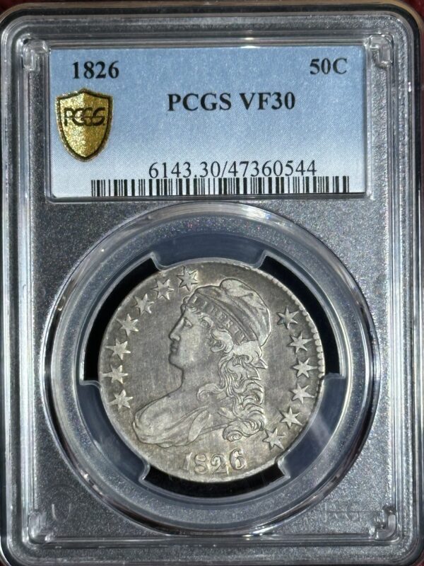 A 1826 Capped Bust Half Dollar PCGS VF30 coin, featuring a profile portrait of lady liberty, encapsulated in a clear protective case.