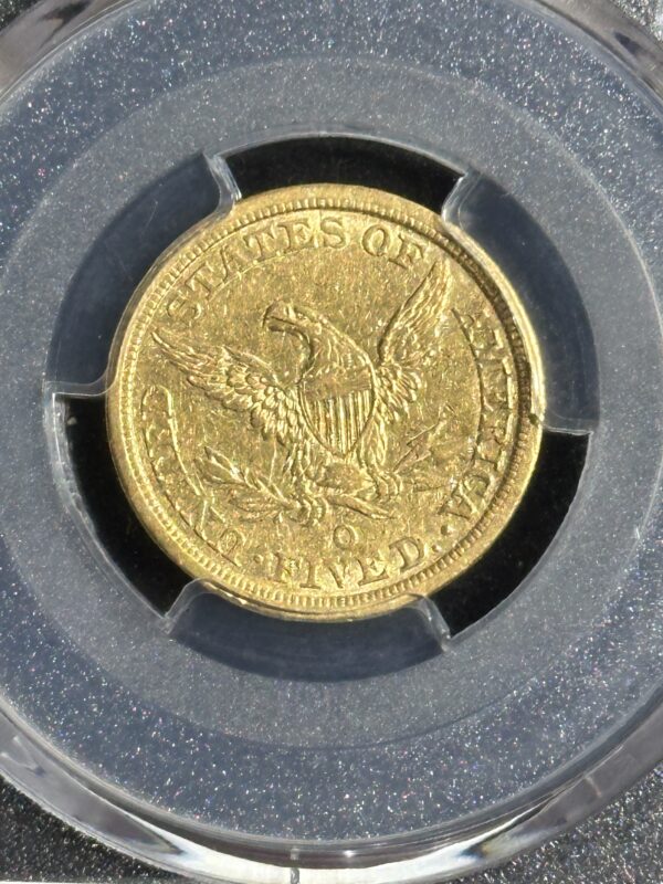 Gold coin with eagle and inscription "States of America".