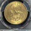 Gold $20 US coin with eagle design.